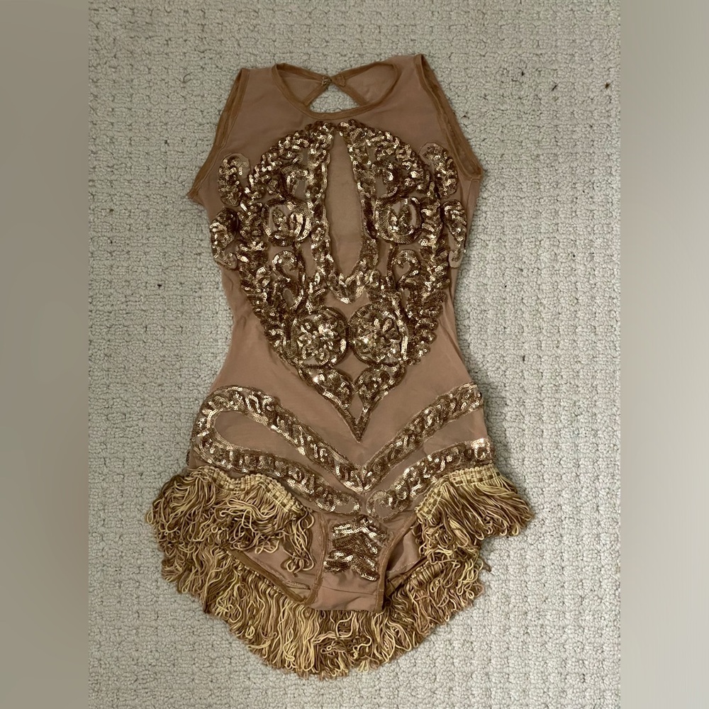 Custom mesh and sequin aerialist costume with tassel detail.